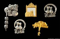 Front view of all five brooches showing designs and finishes