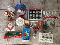 Full lot overview on tile floor showing all items