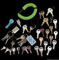 Full lot showing all keys, wrist loops and card