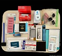 Full layout of all office items in tray