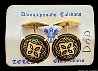 front view of both cufflinks on branded card