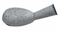 Full side view of white and blue marbled enamel bedpan