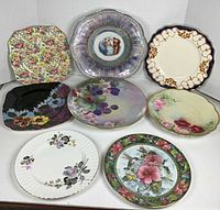 All nine assorted decorative plates arranged for overview
