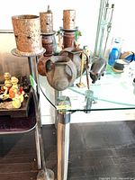 assorted pitchers, wood candle holders, pierced metal holder, floor candle holder, figurines