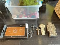 All items laid out: tray and five crucifixes