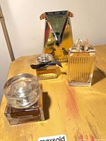 All four fragrance items grouped on tabletop