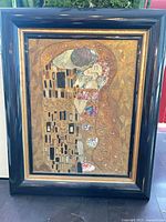 Full view of framed painting showing artwork and frame