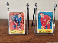 Front views of both hockey cards: Howie Young and Camille Henry