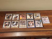 All eleven rookie cards laid out in two rows on table