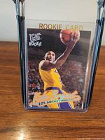 Front view of Kobe Bryant Fleer Ultra rookie card in sleeve