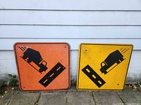 Both construction signs side by side for scale and condition overview