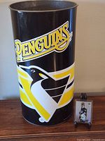 Full view of Pittsburgh Penguins tin and Sidney Crosby card for size context