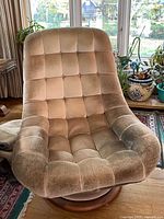 Front angled view of chair showing overall design and upholstery