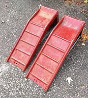 Top view of both red steel ramps showing ribbed platforms