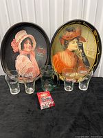 Full lot showing two trays, four glasses, green mug, deck of cards