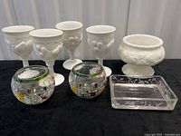 Group view of all eight glass items