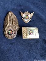 Overview of three AMA Gypsy Tour items on fabric background