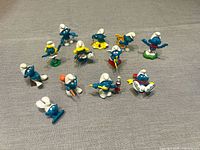 Group shot of all 12 Smurfs figurines