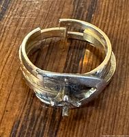 Top view showing split-band design and empty setting