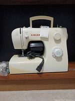 Front view of Singer 2259 sewing machine with handle visible