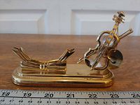 Front view showing card cradle and violin with crystals