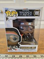 Front view of boxed Funko Pop showing character and series details