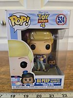 Front of boxed Funko Pop showing figure and number 524
