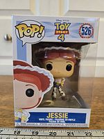 Front view of boxed Funko Pop Jessie #526