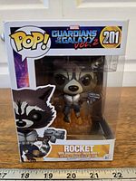 Front view boxed Funko Pop Rocket #201
