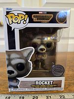 Front of boxed Funko Pop showing character and branding