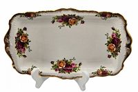 Front view showing floral pattern and gold rim