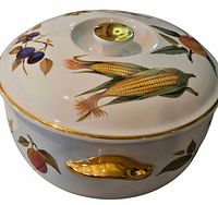 Side view showing body decoration, gold handle