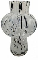 Front view of black and white spatter glass vase