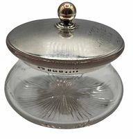 Full view of glass jar with sterling lid