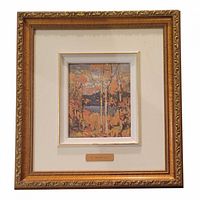 Front view showing framed Tom Thomson print with brass nameplate