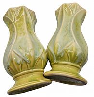 Both glazed vases standing, showing leaf motif and overall color