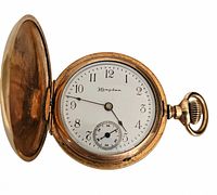 Front view showing porcelain dial, hands and crystal