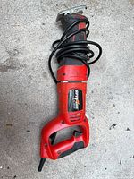 Full view of corded reciprocating saw showing overall condition and absence of blade