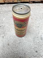 Full view of Budweiser can phone standing upright showing label and top pop-tab