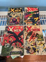 All four X-Men issues laid out together