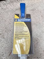 Front view showing clamp handle and packaging insert