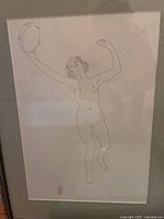 Drawing of nude woman holding tambourine, frame and glass visible