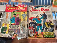 Two Jimmy Olsen comics side-by-side