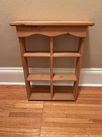 Front view showing six cubbies and overall design