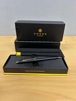 Pen in presentation box with outer sleeve behind