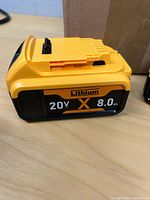 Two yellow/black 20V 8.0Ah batteries face front