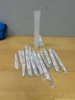 All blades and tubes laid out on table