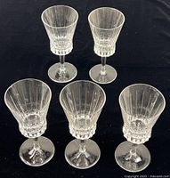 Five Barthmann crystal wine glasses displayed on black background