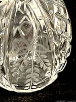 Front view showing etched bow and wheat leaves within cut lattice