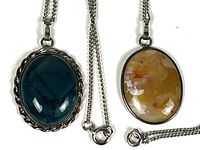 Front view of both stone pendants and chains